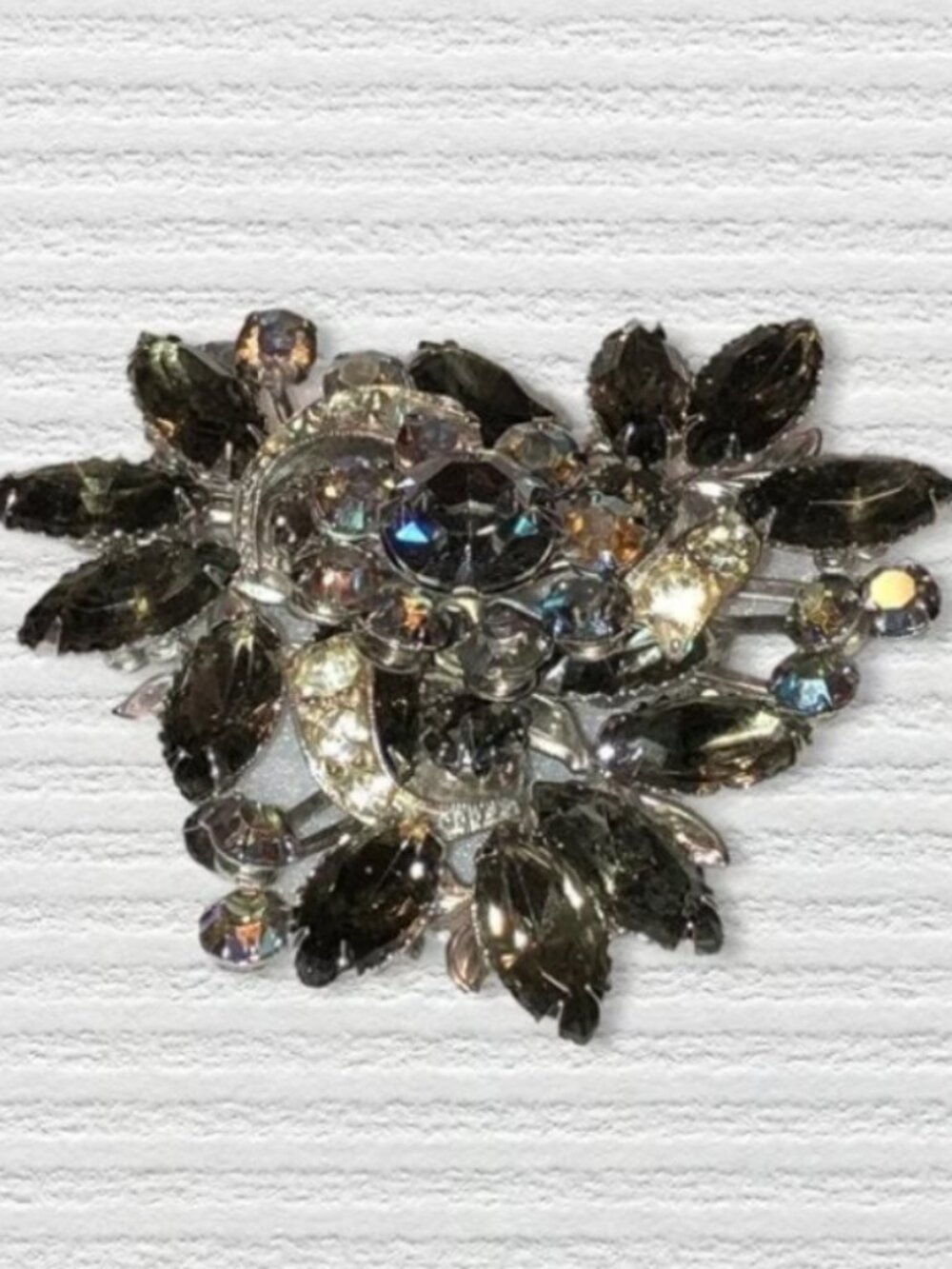 Vintage brooch - smoky grey, clear and iridescent aurora borealis stones
